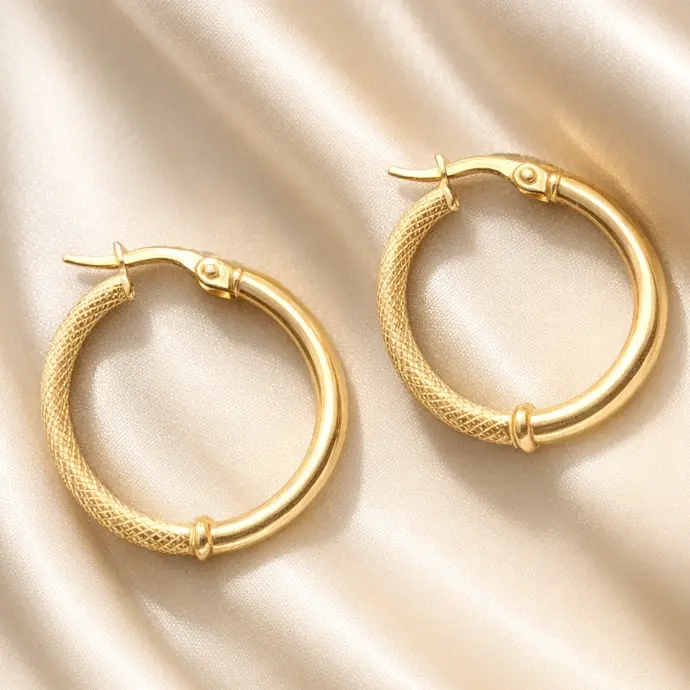 ARGOLLAS REDONDAS de ORO Amarillo de 18 kilates labradas